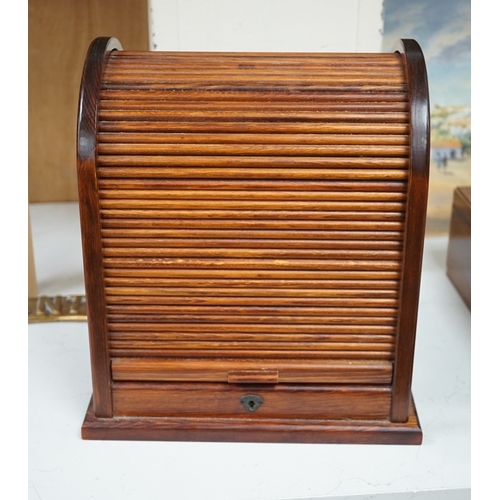 1385 - A tambour fronted stationery rack, 30cm high. Condition - fair