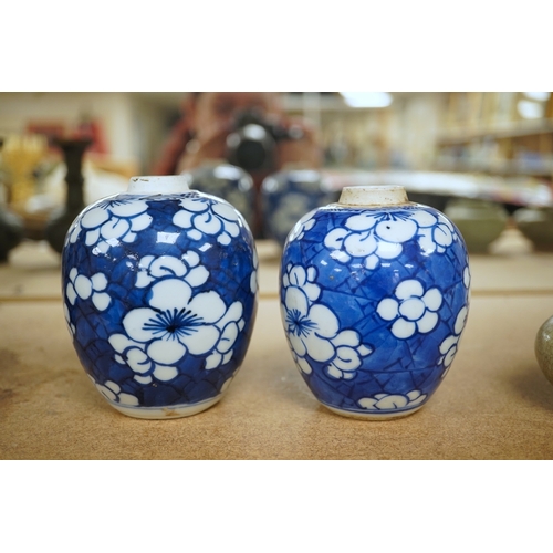 1391 - Two small Chinese blue and white prunus jars, Kangxi period, tallest 9.5cm. Condition - good