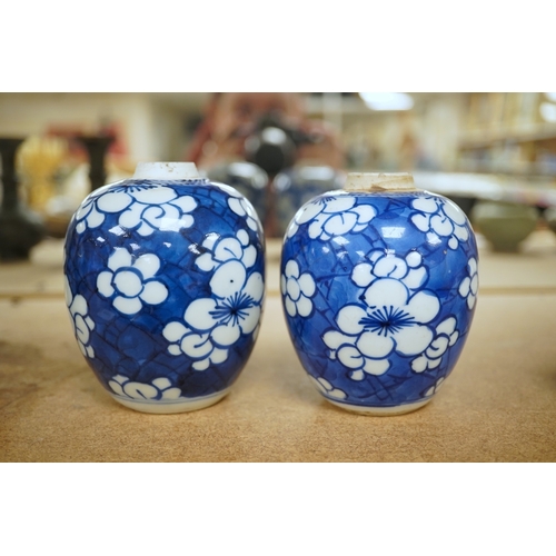 1391 - Two small Chinese blue and white prunus jars, Kangxi period, tallest 9.5cm. Condition - good