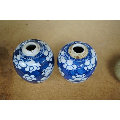 1391 - Two small Chinese blue and white prunus jars, Kangxi period, tallest 9.5cm. Condition - good