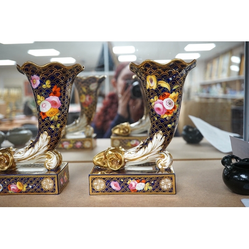 1393 - A pair of Spode cornucopia vases, 18cm high (a.f.). Condition - restored