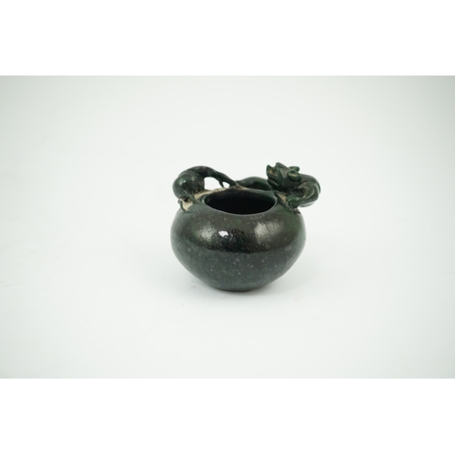 1394 - A Chinese dragon carved green hardstone brushwasher, 5cm high. Condition - good