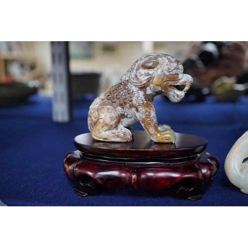 1399 - Three Chinese archaistic jade carvings of a winged mythical beast, a duck and a horned seated beast,... 