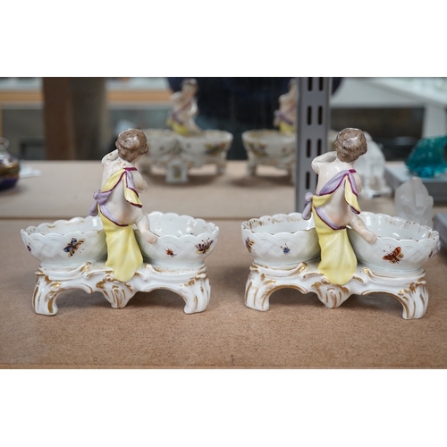 1402 - A pair of Berlin figural porcelain salts, hand painted with birds, 13.5cm wide. Condition - fair to ... 