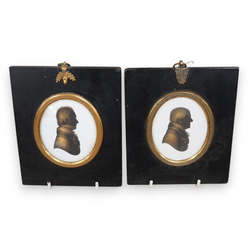 1406 - Miers & Field, two bronzed painted plaster silhouettes of gentlemen, framed. Condition - good