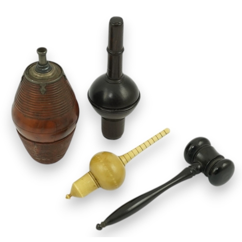 1414 - A 19th century coquilla nut powder flask, a hardwood cased ivorine hydrometer and a small ebony gave... 