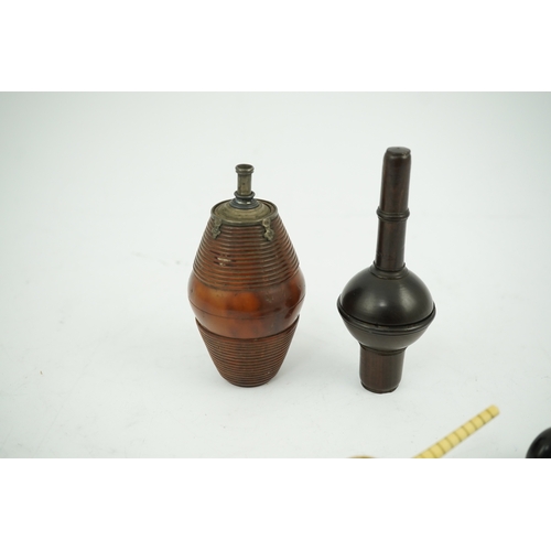 1414 - A 19th century coquilla nut powder flask, a hardwood cased ivorine hydrometer and a small ebony gave... 