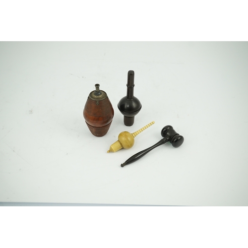 1414 - A 19th century coquilla nut powder flask, a hardwood cased ivorine hydrometer and a small ebony gave... 