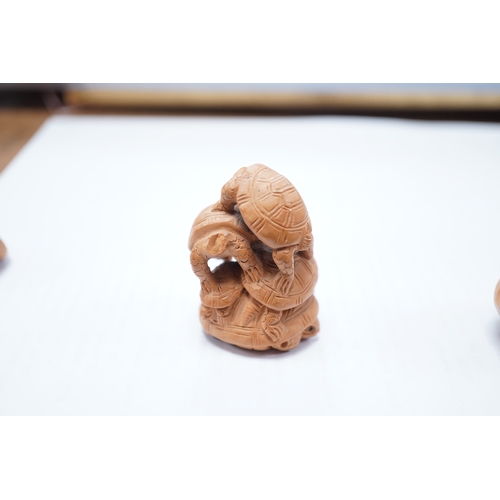 1417 - Three Japanese carved and signed boxwood netsukes, largest 5cm. Condition - two tortoises missing he... 