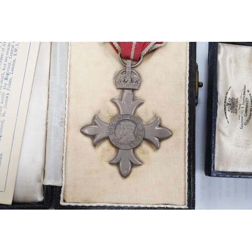 1423 - A cased George V military MBE containing leaflet with instructions as to wearing Insignia, together ... 