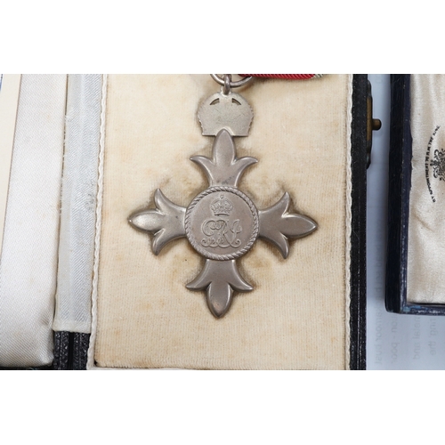 1423 - A cased George V military MBE containing leaflet with instructions as to wearing Insignia, together ... 