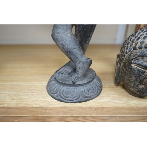 1436 - An Indian stone Buddha head and a figural carving, 29cm. Condition - figure repaired