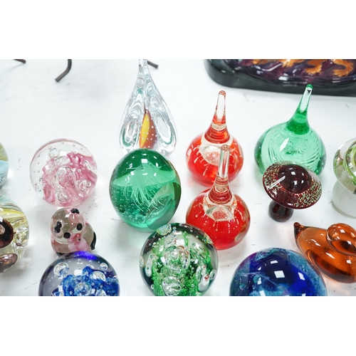 1438 - A group of glass paperweights to include Caithness and Perthshire, largest 14cm high. Condition - go... 