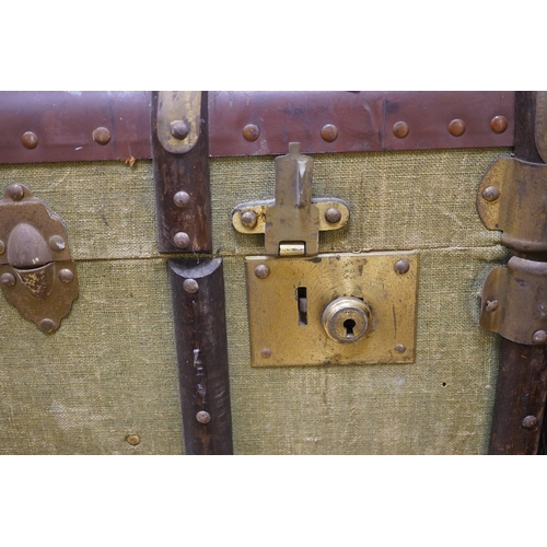 1440 - A steamer trunk and a leather Gladstone bag, trunk 63cm wide. Condition - fair