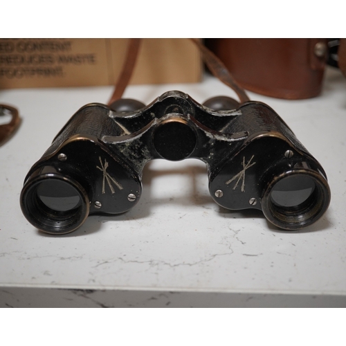 1442 - A pair of Taiga binoculars, various cameras etc. Condition - appears fair