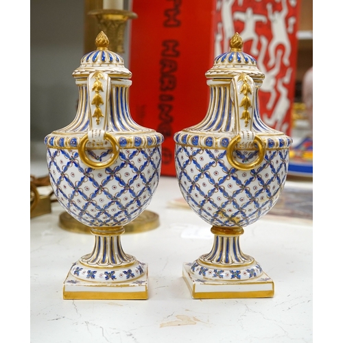 1445 - A pair of early 20th century Sevres style vases and covers, 21cm. Condition - good