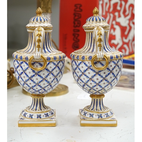 1445 - A pair of early 20th century Sevres style vases and covers, 21cm. Condition - good