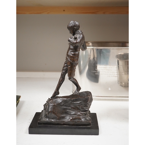 1446 - Lorna Adamson (British b.1894-?), an early 20th century bronze figure of a boy, signed and dated 191... 