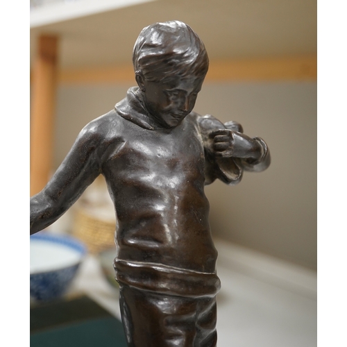 1446 - Lorna Adamson (British b.1894-?), an early 20th century bronze figure of a boy, signed and dated 191... 