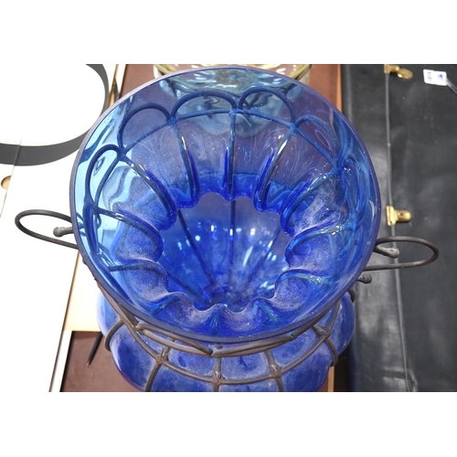 1449 - A wrought and cast iron mounted large blue glass vase, 49cm. Condition - would benefit from a clean,... 