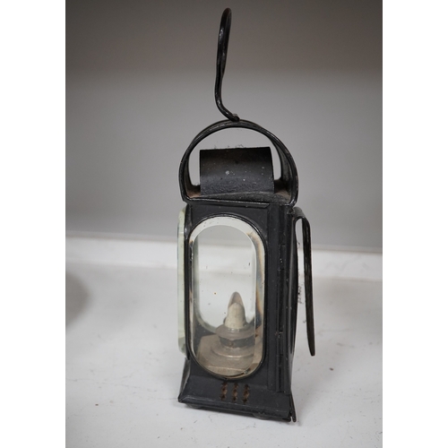 1456 - An early 19th century oak candlebox, an iron oil lamp, a brass miners lamp, a small brass bound coo... 