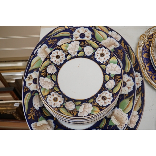 1458 - A Victorian Ironstone part set of floral decorated tableware. Condition - some items damaged