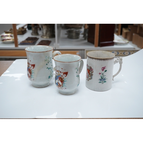 1475 - Three 18th century Chinese export armorial mugs, largest 14cm high. Condition - all restored