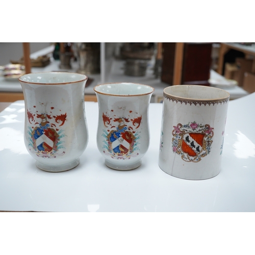 1475 - Three 18th century Chinese export armorial mugs, largest 14cm high. Condition - all restored