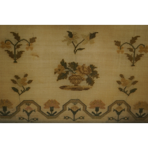 1503 - A wide mahogany framed sampler by Ann Whitehouse dated 1834, worked in coloured silks on a fine line... 