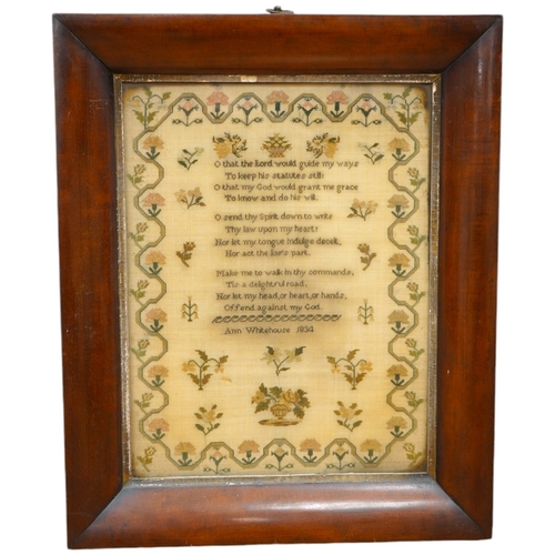 1503 - A wide mahogany framed sampler by Ann Whitehouse dated 1834, worked in coloured silks on a fine line... 