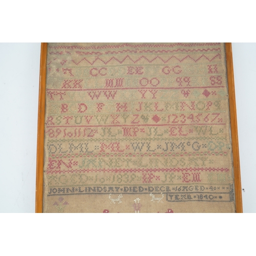 1505 - An alphabet cross stitch sampler with a figurative lower spot motif panel and commemorative dedicati... 