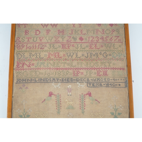 1505 - An alphabet cross stitch sampler with a figurative lower spot motif panel and commemorative dedicati... 