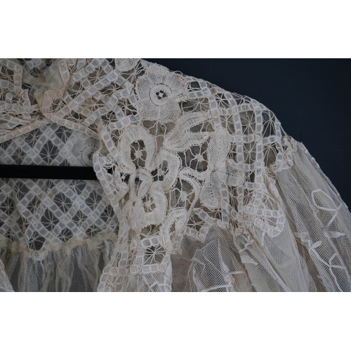 1507 - An Edwardian high collared cream tape lace wedding over blouse, made with a deep net frill and cream... 