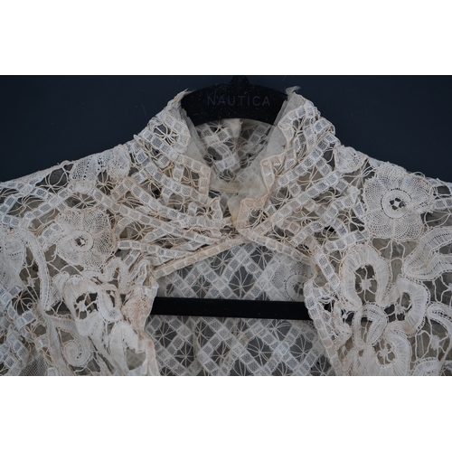 1507 - An Edwardian high collared cream tape lace wedding over blouse, made with a deep net frill and cream... 