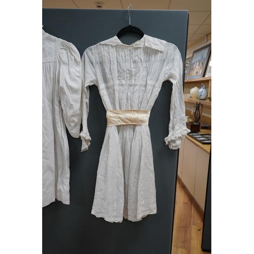 1508 - Two late 19th early 20th century girls summer dresses, one fine cotton with white worked collar cuff... 