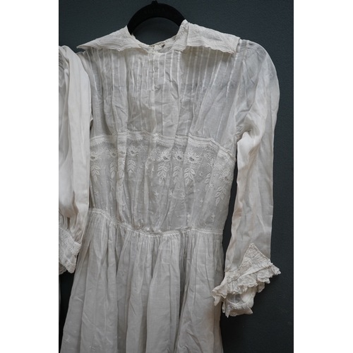 1508 - Two late 19th early 20th century girls summer dresses, one fine cotton with white worked collar cuff... 