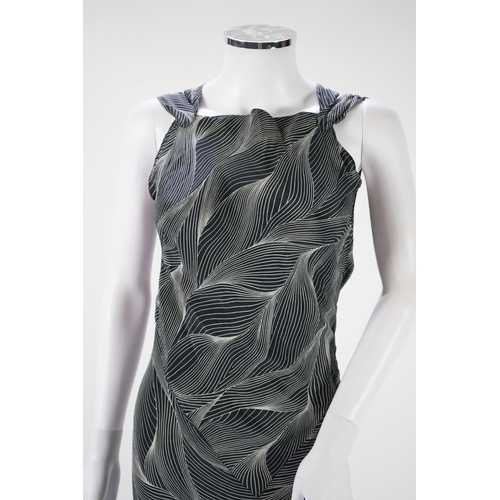 1510 - A 1930's black and silver halter neck, bias cut, ladies silk evening dress, designed with a loosely ... 