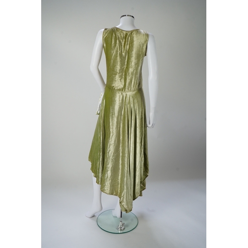 1511 - A late 1920s early 30s green panne silk velvet evening dress, bias cut, with large diamanté orname... 