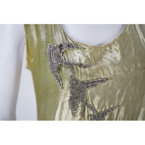 1511 - A late 1920s early 30s green panne silk velvet evening dress, bias cut, with large diamanté orname... 