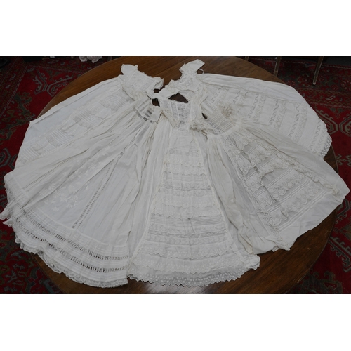 1526 - Five Victorian white worked fine cotton and lawn babys christening gowns. mostly worked with embroi... 