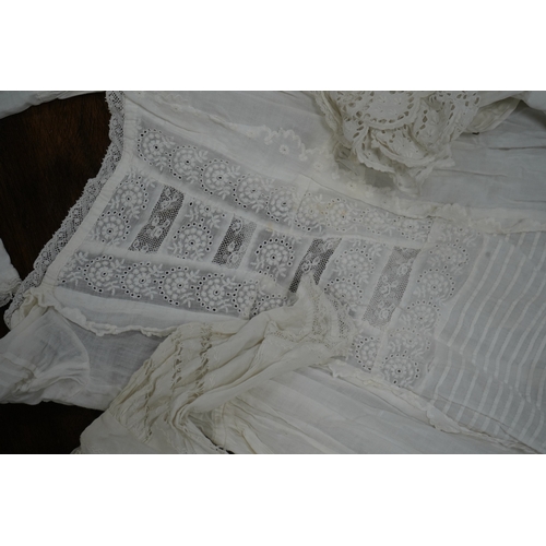 1526 - Five Victorian white worked fine cotton and lawn babys christening gowns. mostly worked with embroi... 