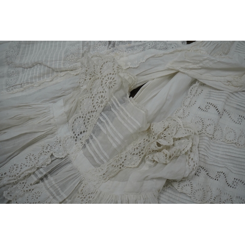 1526 - Five Victorian white worked fine cotton and lawn babys christening gowns. mostly worked with embroi... 