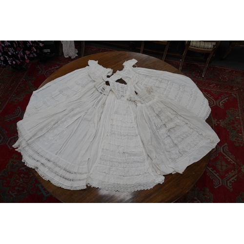 1526 - Five Victorian white worked fine cotton and lawn babys christening gowns. mostly worked with embroi... 