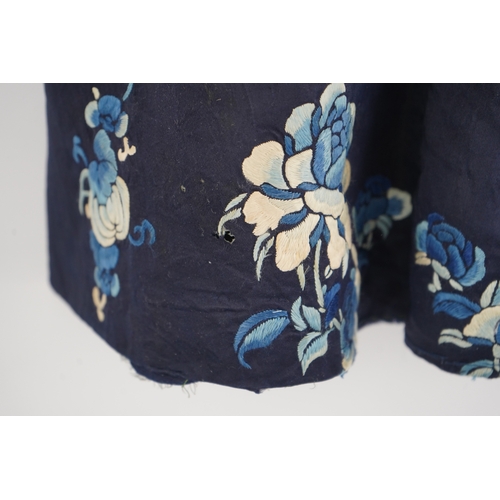 1531 - An early 20th century blue silk embroidered Chinese childs robe, embroidered with bats and flower m... 