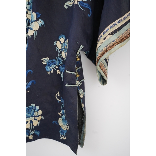 1531 - An early 20th century blue silk embroidered Chinese childs robe, embroidered with bats and flower m... 