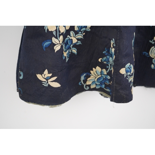 1531 - An early 20th century blue silk embroidered Chinese childs robe, embroidered with bats and flower m... 