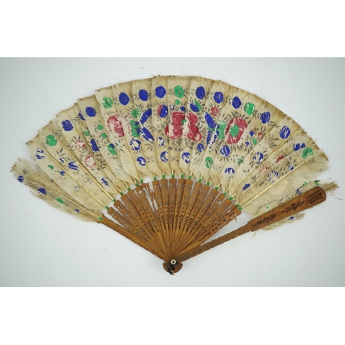 1532 - Three 19th century Chinese feather fans: One a carved bone brise black feather fan together with two... 