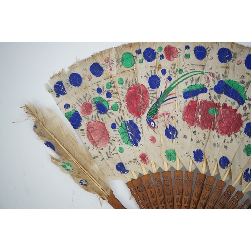 1532 - Three 19th century Chinese feather fans: One a carved bone brise black feather fan together with two... 