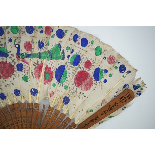 1532 - Three 19th century Chinese feather fans: One a carved bone brise black feather fan together with two... 