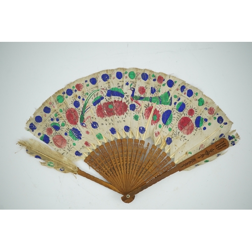 1532 - Three 19th century Chinese feather fans: One a carved bone brise black feather fan together with two... 